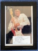 Singer, Hank Marvin 14x10 framed signature piece featuring a colour photograph of the musician