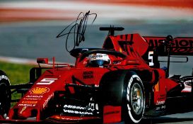 Sebastian Vettel signed Ferrari Formula One 12x8 colour photo.