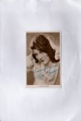 Olivia Borden Signed 6X4 Vintage Photo. Attached to A4 Sheet. Borden was an American film and