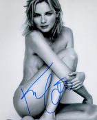 Kim Cattrall signed 10x8 black and white glamour photo. Good condition. All autographs come with a