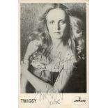 Twiggy signed 6x4 black and white promo photo dedicated. Good condition. All autographs come with