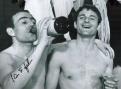 Ian St John signed 16x12 black and white photo pictured with fellow Anfield legend Roger Hunt.