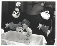 Actor Donnie Dunagan signed 10x8 black and white photo of a young Dunagan with Mickey and Minnie