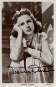 Deanna Durbin (1921 2013) Actress Signed Postcard Photo. Good condition. All autographs come with