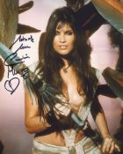 007 Bond girl Caroline Munro signed sexy At The Earth s Core movie 8x10 photo. Good condition. All