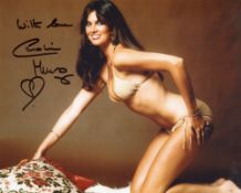 007 Bond girl Caroline Munro signed sexy and stunning 8x10 photo. Good condition. All autographs