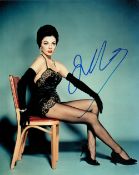 Joan Collins signed 10x8 colour photo. Good condition. All autographs come with a Certificate of