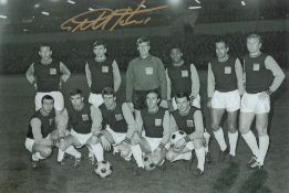 Geoff Hurst signed West Ham United 12x8 black and white team photo. Sir Geoffrey Charles Hurst