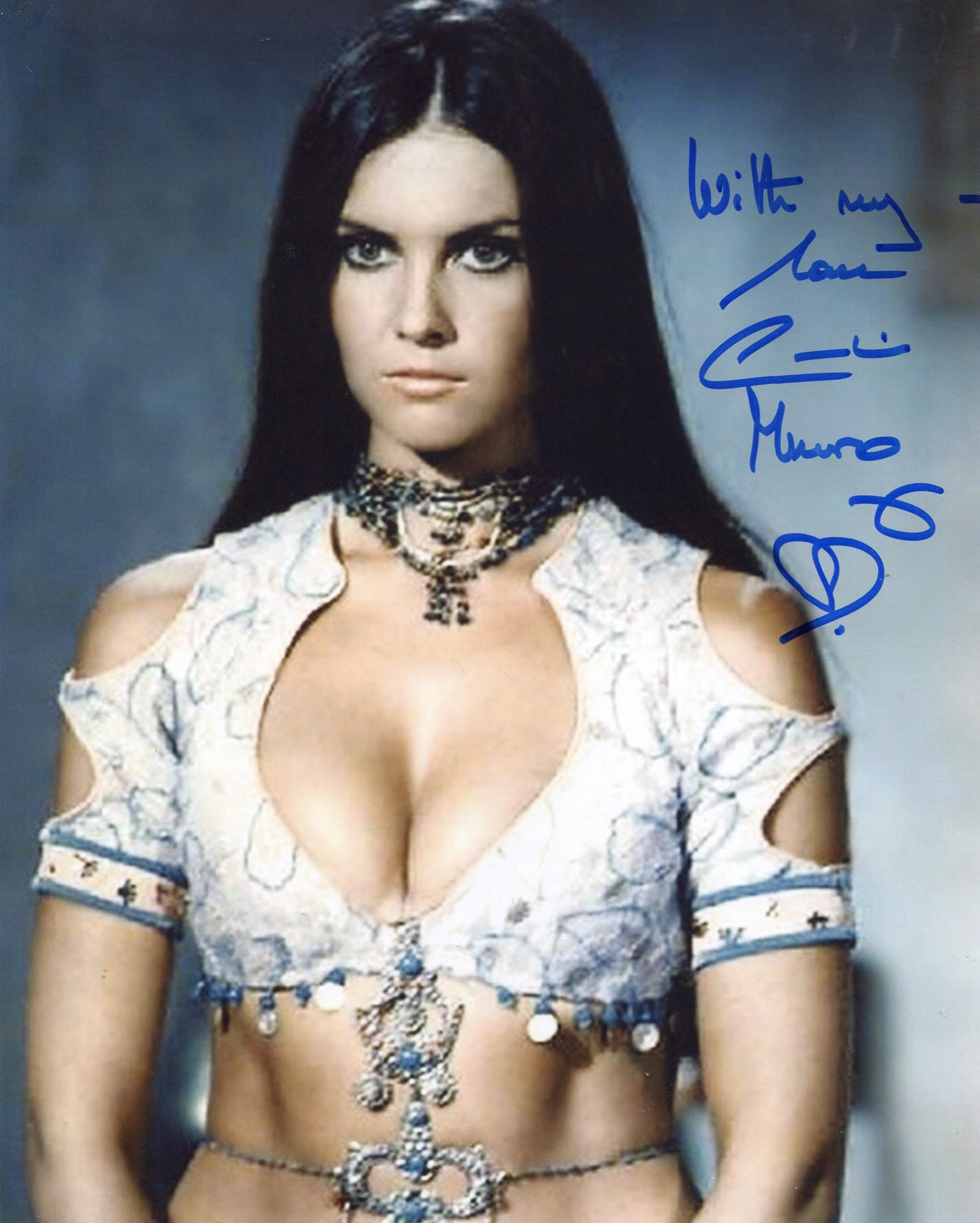 007 Bond girl Caroline Munro signed sexy 8x10 photo. Good condition. All autographs come with a