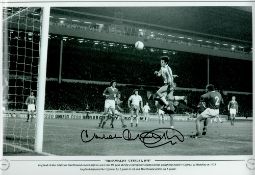 Football Malcom MacDonald signed 18x12 black and white print picture scoring his Fourth goal against