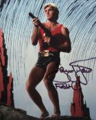 Flash Gordon movie photo signed by Flash Gordon himself, actor Sam J Jones. Good condition. All