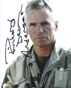 Stargate 8x10 photo signed by actor Richard Dean Anderson. Good condition. All autographs come