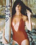 007 Bond girl Caroline Munro signed 8x10 The Spy Who Loved Me sexy swimsuit photo. Good condition.