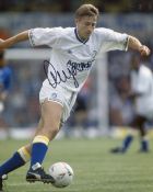 Leeds United former striker Lee Chapman signed 8x10 action photo. Good condition. All autographs