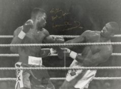 Lennox Lewis Signed 12x16 Photo Boxing Razor Ruddock. Good condition. All autographs come with a