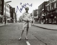 Twiggy. Stunning 8x10 photo signed by 60 s fashion icon, Twiggy. Good condition. All autographs come