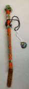 Pele Collection Pele Riding Crop. A horse riding crop owned by Pelé, decorated in orange thread with