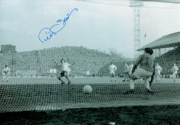 Peter Storey signed 12x8 black and white photo pictured scoring from the spot during 1971 FA Cup