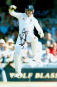 Matt Prior signed 12x8 colour photo pictured while playing for England during an Ashes series.
