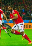 Football Ashley Williams signed 12x8 colour photo pictured celebrating while playing for Wales.