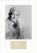 Spencer Tracy signature piece mounted below b/w photo. Approx overall size 14x11. Good condition.