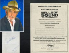 Don Williams signed lined page with unsigned colour photo. Good condition. All autographs come