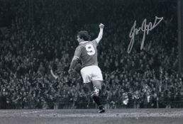 Autographed Joe Jordan 12 X 8 Photo - B/W, Depicting The Man United Striker Running Away In