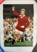 Manchester United Legend Dennis Law Hand signed 23x16 approx Colour Print. Print has few creases