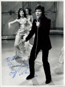 Cliff Richard signed 9x7 black and white photo dedicated. Obtained by Alex Brown who was the piano