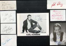 EastEnders collection of signed 8 pages and photographs featuring signatures from stars of the