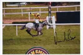 Martin Pipe Jockey Signed 6 x 4 photo. Photo shows Pipe riding his horse in the races. Good