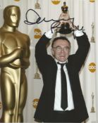 Director Danny Boyle singed 10x8 colour photo showing him holding up an Oscar. Daniel Francis