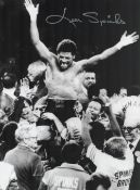 Boxing Leon Spinks signed 16x12 black and white photo pictured after his shock victory over Muhammad