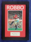 Football, Bryan Robson signed colour photograph, mounted and presented in a frame. With an approx