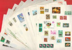 Approximately 500 Worldwide International Stamps On 21 A4 Paper Sheets. Good condition. All