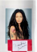 Thandie Newton Signed album page. Also includes unsigned Model shot. Newton OBE, is an English