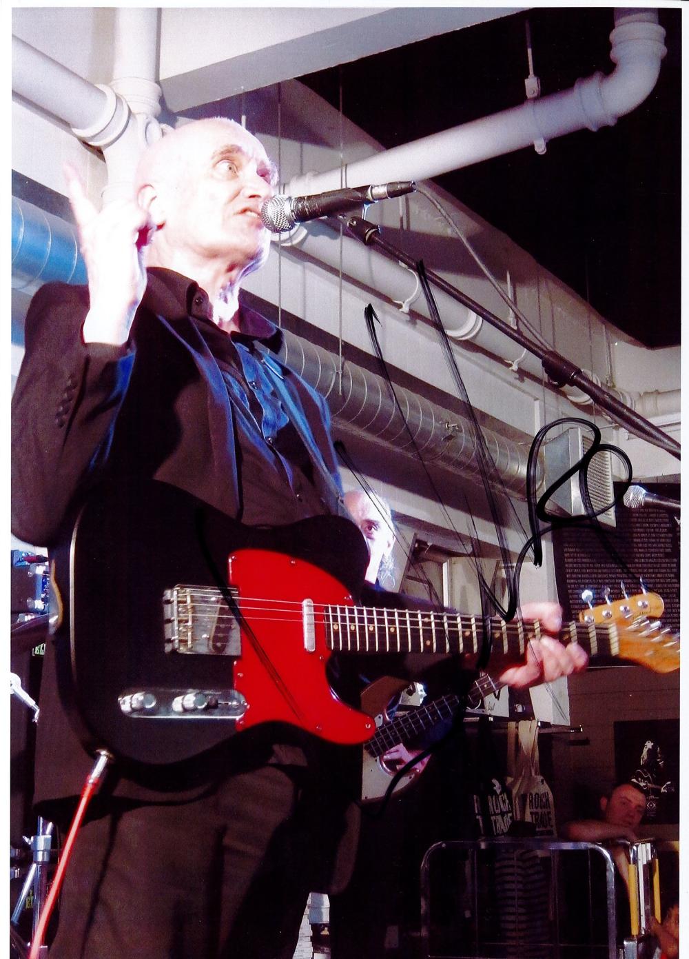 English Guitarist Wilko Johnson Personally Signed 12x8 Colour Photo. Signed in black marker pen at