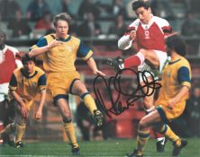 Arsenal FC Alan Smith Hand signed 10x8 Colour Photo. Photo shows Smith taking a shot against an