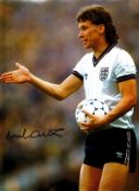 Football. Mick Duxbury Signed 16x12 colour photo. Photo is showing Duxbury in action for England,