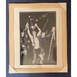 Football. Crerand and Stepney signed black and white photograph, mounted and presented in a frame,