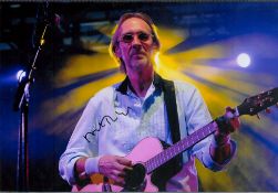 Guitarist, Mike Rutherford signed 12x8 inch colour photograph pictured whilst he performs.