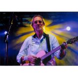 Guitarist, Mike Rutherford signed 12x8 inch colour photograph pictured whilst he performs.