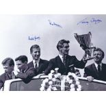 Autographed Tottenham 16 X 12 Photo - B/W, Depicting Ron Henry Holding The European Cup Winners
