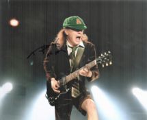 Angus Young signed ACDC 10x8 inch colour photo. Angus McKinnon Young (born 31 March 1955) is an