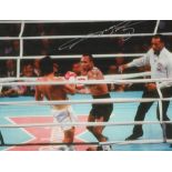 Boxing Sugar Ray Leonard signed 16x12 inch colour photo pictured during one of his fights with