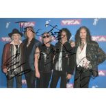 Aerosmith multisigned 12x8 inch colour photo signed by all five band members including Steve