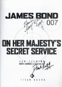 James bond, Diana Rigg and George Lazenby signed 007, Titan Books comic book titled- On Her