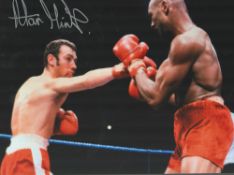 Boxing Alan Minter signed 16x12 inch colour photo pictured during his fight with Marvin Hagler. Good