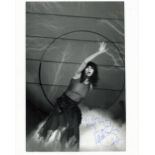 Singer, Kate Bush signed 10x8 inch black and white photograph signed in blue pen, dedicated and