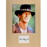 Paul Hogan 16x12 inch overall Crocodile Dundee mounted signature piece includes signed album page